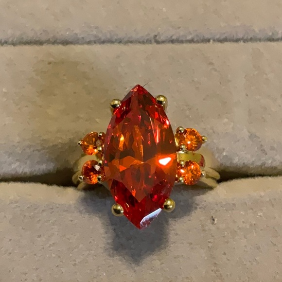 Elegant Gold Toned Sterling Silver and Red Gemstone Ring - Picture 1 of 5